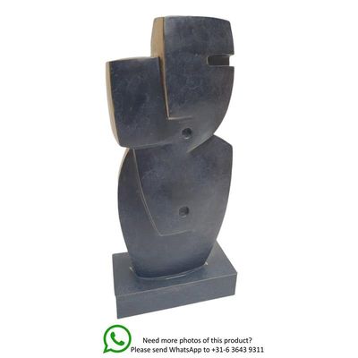 AN ABSTRACT BRONZE SCULPTURE