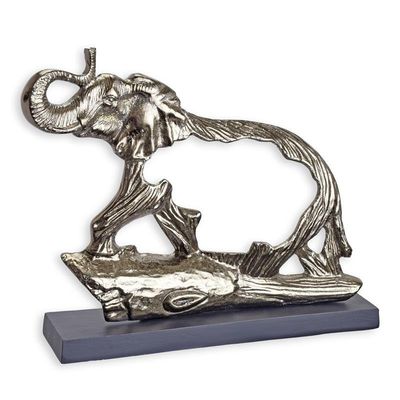 AN ALUMINIUM PIERCED SCULPTURE OF AN ELEPHANT