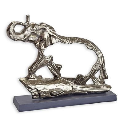 AN ALUMINIUM PIERCED SCULPTURE OF AN ELEPHANT