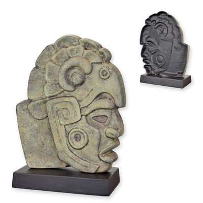 AN ALUMINUM CEREMONIAL SCULPTURE OR HACHA