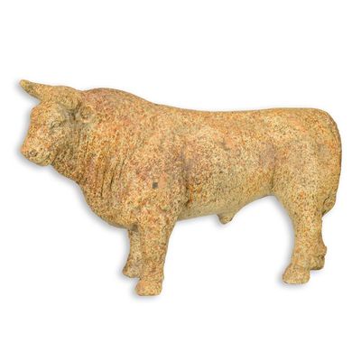AN ANTIQUE STYLE MGO SCULPTURE OF A BULL