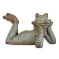 AN ANTIQUE STYLE MGO SCULPTURE OF A RECLINING FROG