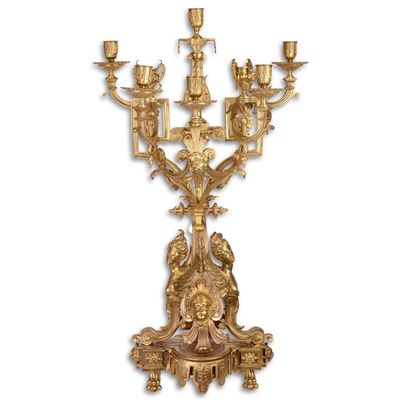 AN EIGHT LIGHT GILT CANDELABRUM