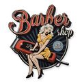 AN EMBOSSED TIN PLATE - BARBER SHOP