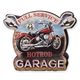 AN EMBOSSED TIN PLATE - FULL SERVICE HOTROD GARAGE