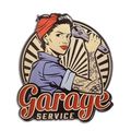 AN EMBOSSED TIN PLATE - GARAGE SERVICE