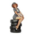 AN EMBOSSED TIN PLATE - LADY ON TIRES