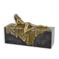 AN EROTIC BRONZE SCULPTRURE OF A RECUMBENT FEMALE NUDE