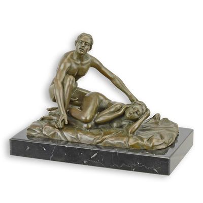 AN EROTIC BRONZE SCULPTURE