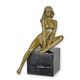 AN EROTIC BRONZE SCULPTURE OF A FEMALE NUDE