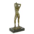 AN EROTIC BRONZE SCULPTURE OF A FEMALE NUDE