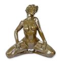 AN EROTIC BRONZE SCULPTURE OF A FEMALE NUDE