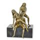 AN EROTIC BRONZE SCULPTURE OF A MALE AND FEMALE NUDES