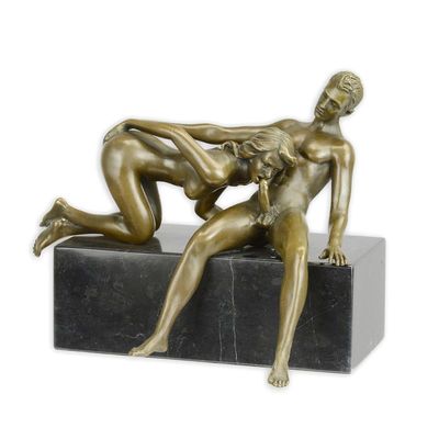 AN EROTIC BRONZE SCULPTURE OF A NUDE COUPLE