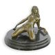 AN EROTIC BRONZE SCULPTURE OF A RECLINING FEMALE NUDE