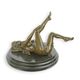 AN EROTIC BRONZE SCULPTURE OF A RECLINING FEMALE NUDE