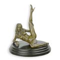 AN EROTIC BRONZE SCULPTURE OF A RECLINING FEMALE NUDE