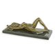 AN EROTIC BRONZE SCULPTURE OF A RECUMBENT FEMALE NUDE