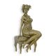 AN EROTIC BRONZE SCULPTURE OF A SEMI NUDE FEMALE ON CHAIR