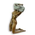 AN EROTIC BRONZE SCULPTURE OF AN UNDRESSING FEMALE