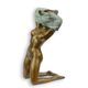 AN EROTIC BRONZE SCULPTURE OF AN UNDRESSING FEMALE
