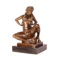 AN EROTIC BRONZE SCULPTURE OF SEMI NUDE FEMALE TAKING OFF HE