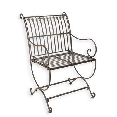 AN IRON ARMCHAIR - BROWN