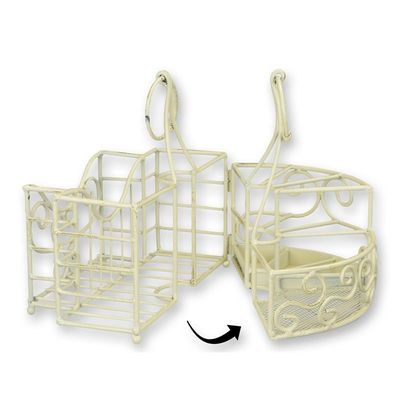 AN IRON CUTLERY AND NAPKIN HOLDER