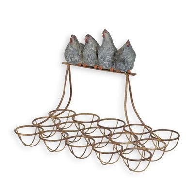 AN IRON EGG RACK MOUNTED WITH RESIN HENS