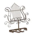 AN IRON MUSIC OR MENU STAND - BROWN