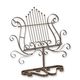 AN IRON MUSIC OR MENU STAND - BROWN