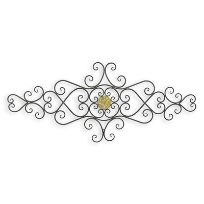 AN IRON ORNAMENTAL WALL DECOR