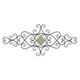 AN IRON ORNAMENTAL WALL DECOR
