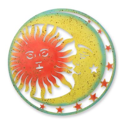 AN IRON SUN AND MOON WALL DECOR