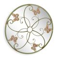AN IRON WALL MIRROR MOUNTED WITH BUTTERFLIES