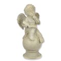 AN MGO SCULPTURE OF A PUTTO READING
