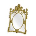 AN ORNATE RESIN MIRROR - GOLD