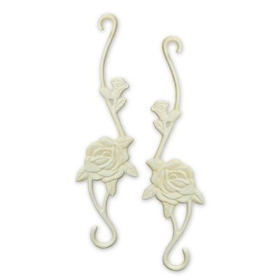 XX A PAIR OF CAST IRON HOOKS