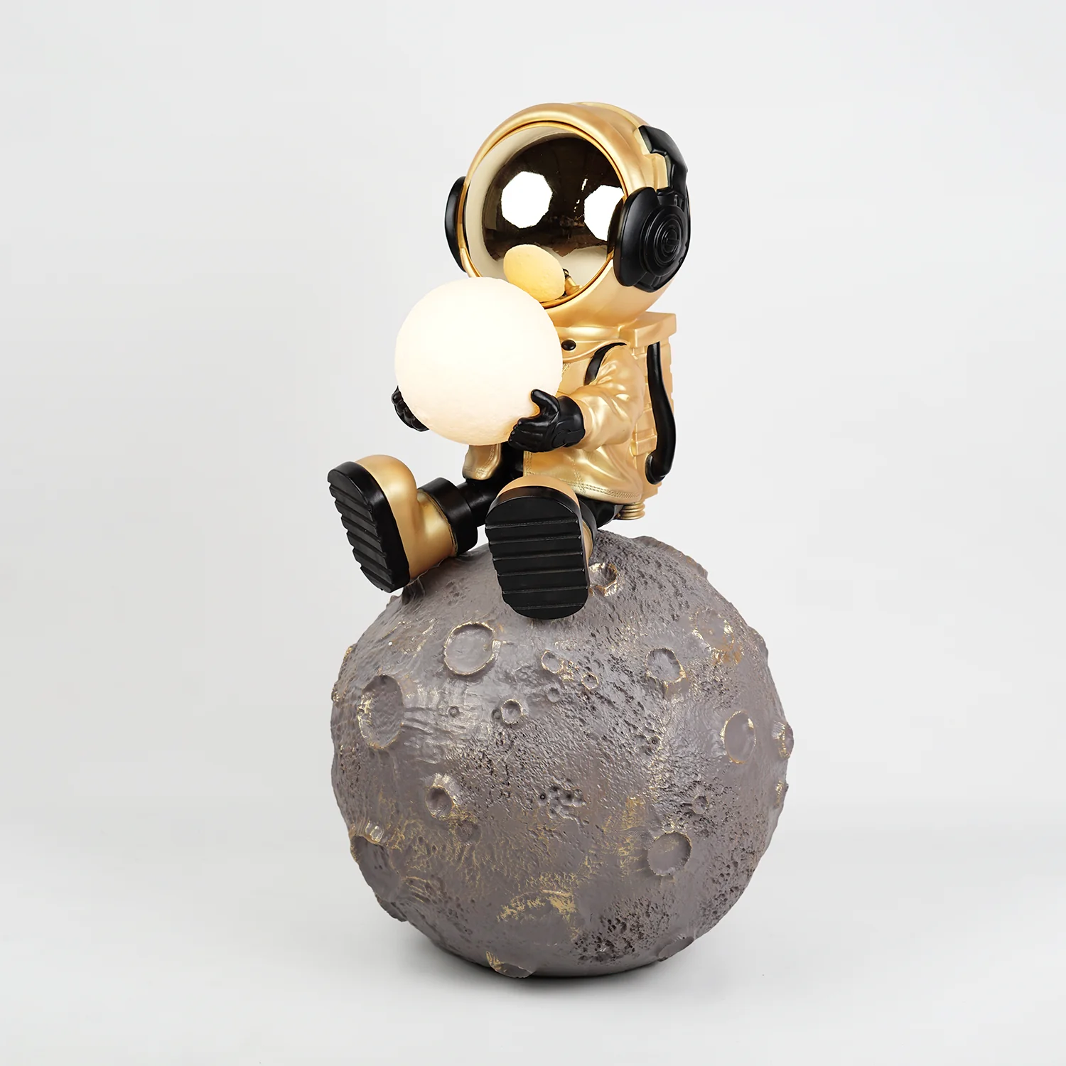 Astronaut Sitting on the Planet + Light